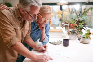 couple reading insurance policy